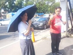 Di Bawah Terik Mentari, Wanita Korban KDRT Suami Demo Tunggal di Kejati Sumut