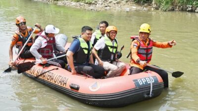 HUT ke-18 Gerindra, Bobby Nasution Bersihkan Sungai dan Sapa Warga Aur